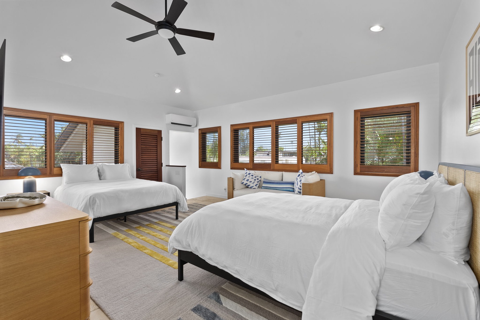 Honolulu Vacation Rentals, Honolulu Lagoonfront Villa - The upper-level queen suite features two beds and wraparound windows—ideal for teens, friends, or extra guests.