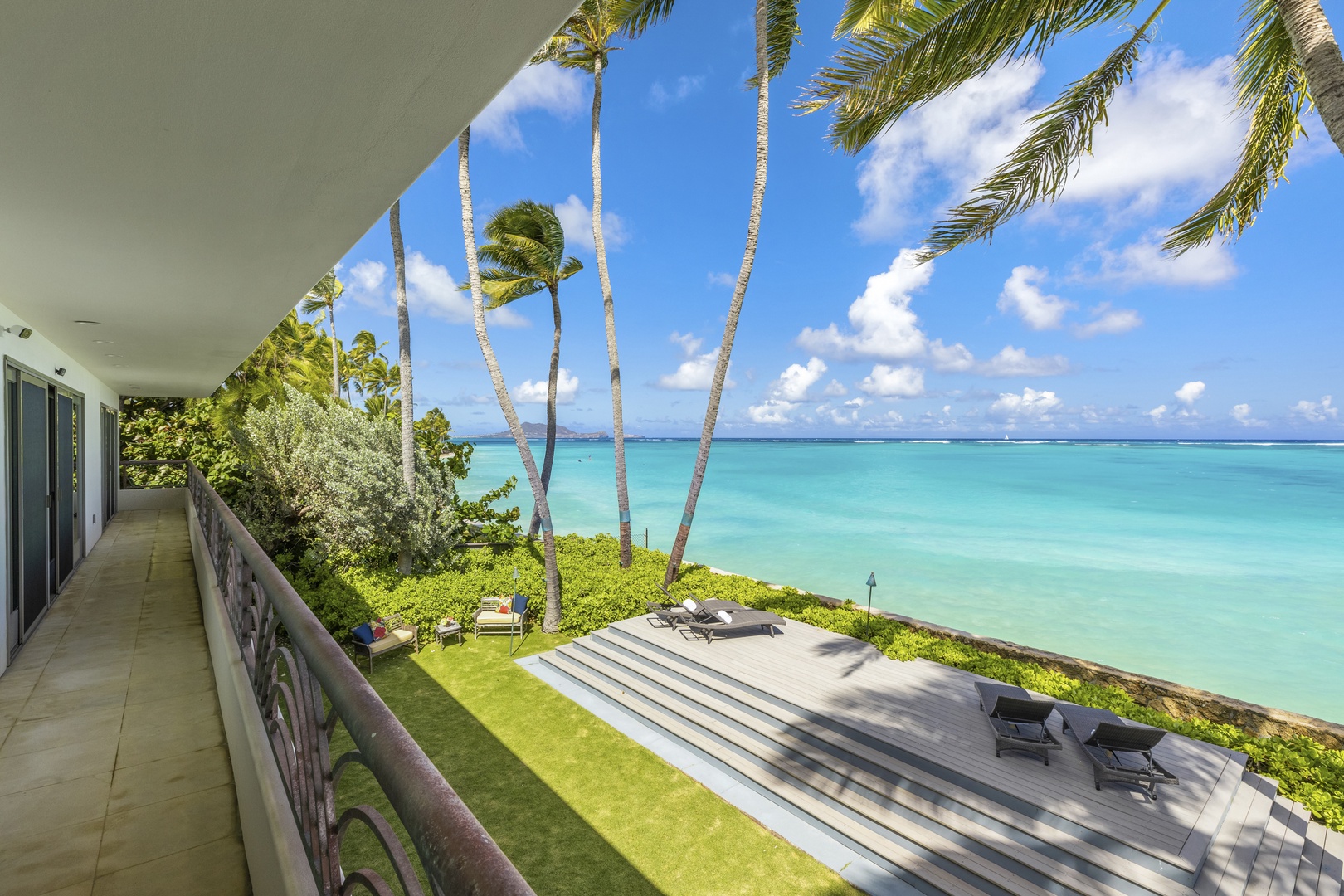 Kailua Vacation Rentals, Mokulua Sunrise - Just feet away, the dazzling turquoise waters and gentle lapping waves of Lanikai Beach will make you feel like you’ve stumbled upon your own private isle!