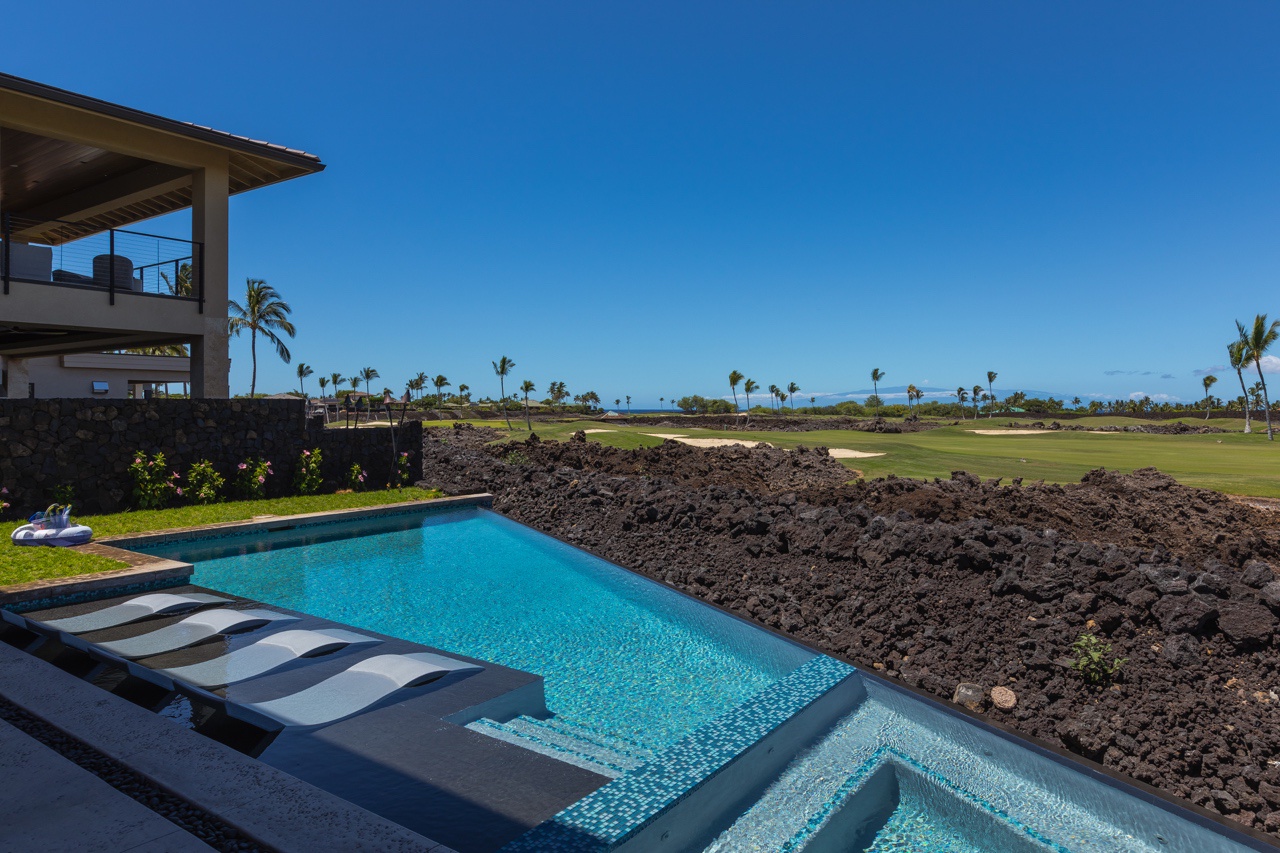 Waimea Vacation Rentals, 5BD Mauna Lani Lux Golf Estate (4) at One Ocean - Dive into luxury with this striking infinity pool overlooking a lush golf course.