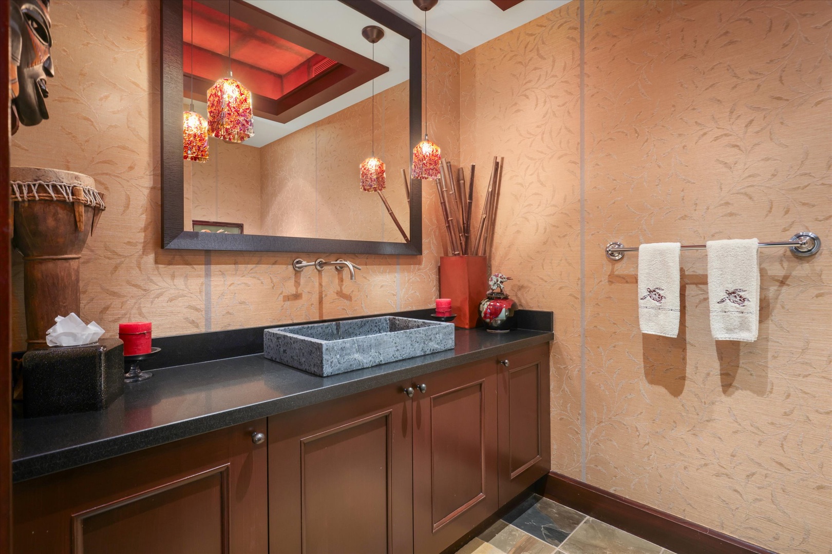 Kailua Kona Vacation Rentals, Wai'ulu Villa 115D - Powder room with dramatic lighting and artistic finishes—perfect blend of form and function.