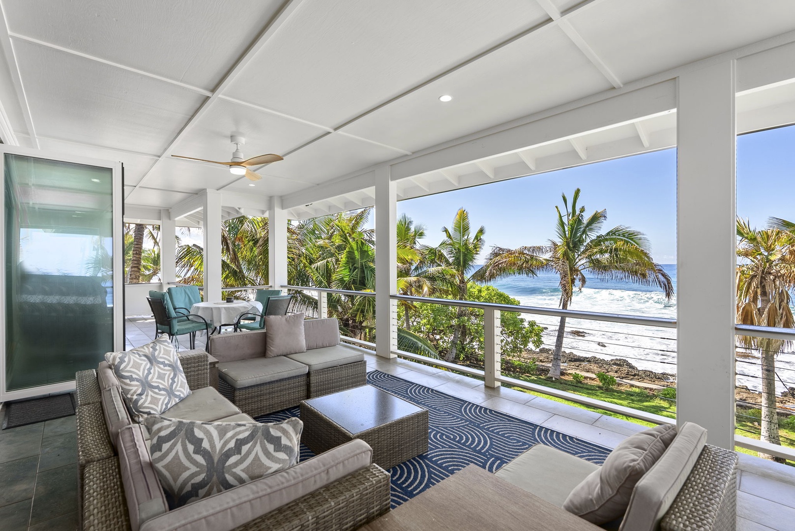 Waianae Vacation Rentals, Oceanfront Luxury Dream Estate - Covered upper balcony with cozy seating and sweeping views of Wai?anae coast.