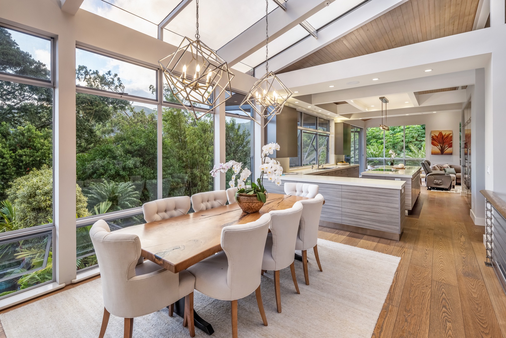 Honolulu Vacation Rentals, Manoa Royal Retreat - Bright dining space with glass ceiling and lush treetop views—dine in the heart of the rainforest.