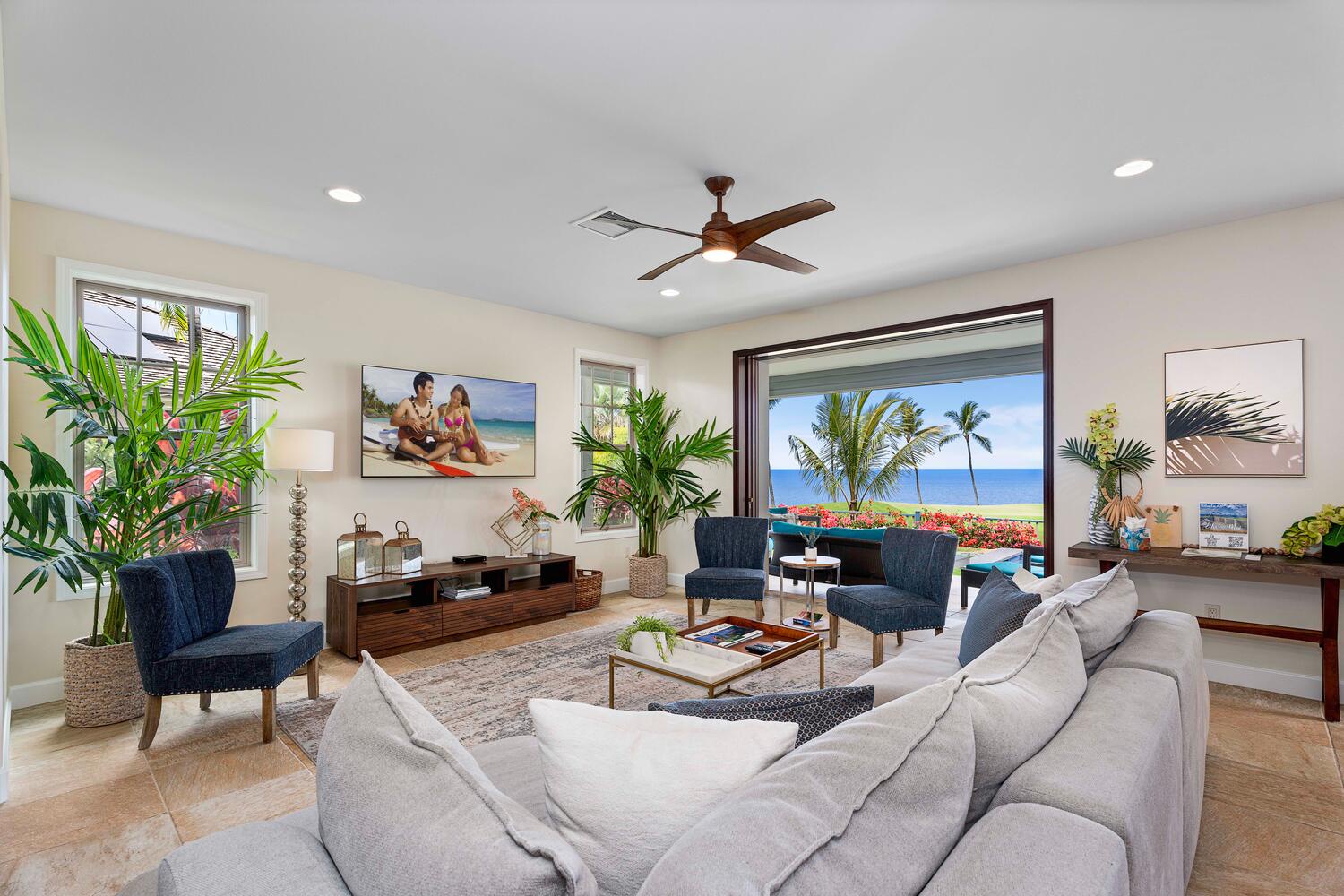 Kailua-Kona Vacation Rentals, Holua Kai #26 - Living room with a stunning ocean view and tropical decor elements.