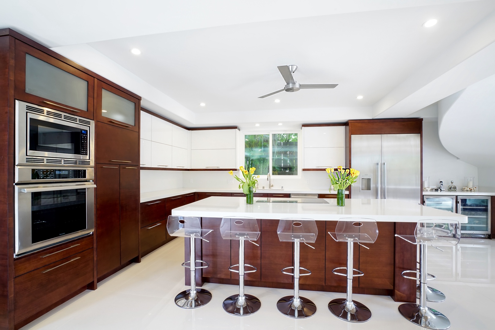 Honolulu Vacation Rentals, Diamond Head Villa* - Chef’s kitchen with breakfast bar, stainless appliances, and sleek, modern design.