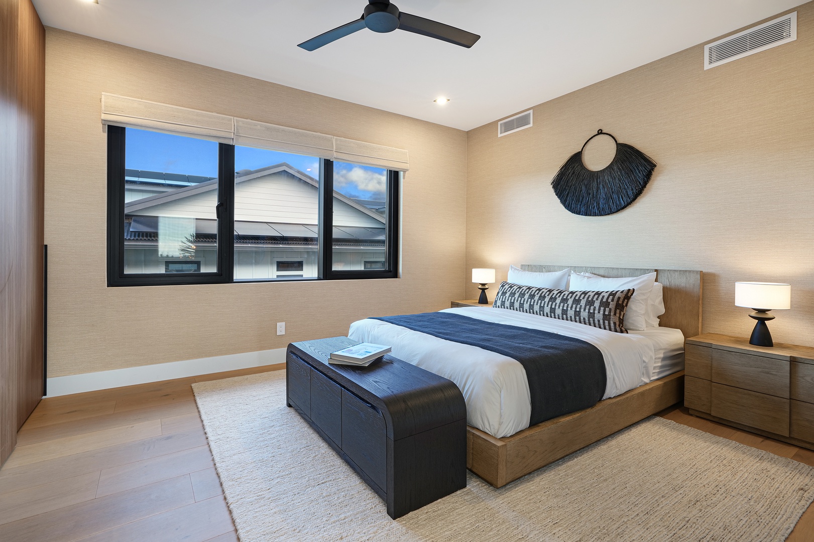 Koloa Vacation Rentals, Hale Hanohano - Guest suite with king bed, soft tones, and tranquil mountain outlook.