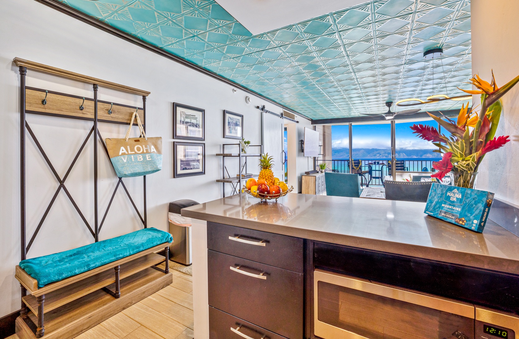 Lahaina Vacation Rentals, Valley Isle 804 - This bright and open kitchen space effortlessly connects to the living area, offering easy access to stunning ocean views while preparing meals