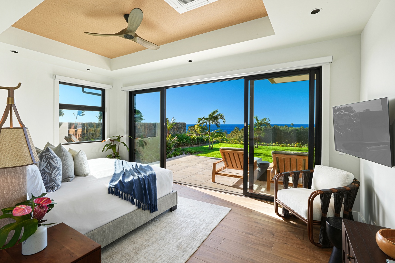 Koloa Vacation Rentals, Ke Kai Nui at Kukuiula - Bask in comfort and elegance in a second bedroom that blends luxury with expansive outdoor views.