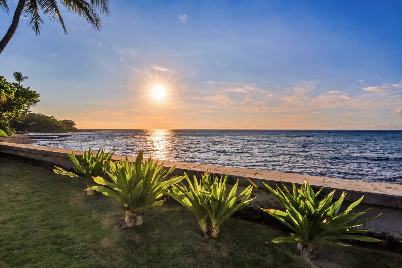 Kamuela Vacation Rentals, Island Time Retreat - Follow the seawall path along the water's edge as the sky lights up.