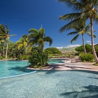 Kamuela Vacation Rentals, Mauna Lani KaMilo #503 - Unwind beneath the palms at the resort’s lagoon-style pool, a refreshing retreat perfect for a leisurely dip or poolside relaxation.