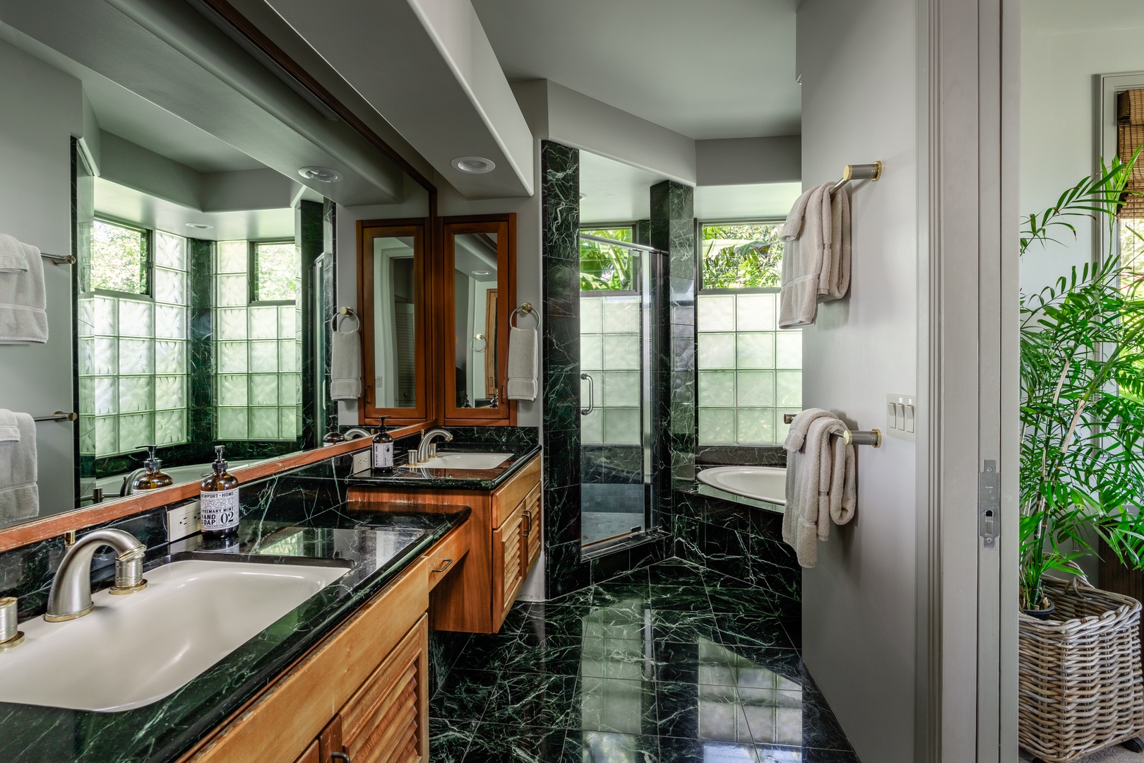 Kamuela Vacation Rentals, Champion Ridge 24 - Elegant bathroom featuring marble finishes, dual sinks, and a jetted tub