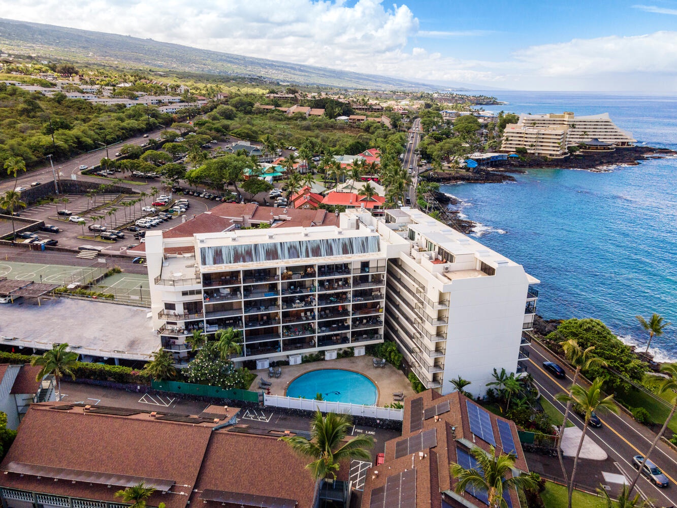 Kailua Kona Vacation Rentals, Kona Alii 403 - Aerial shot of the condo building highlighting the pool.