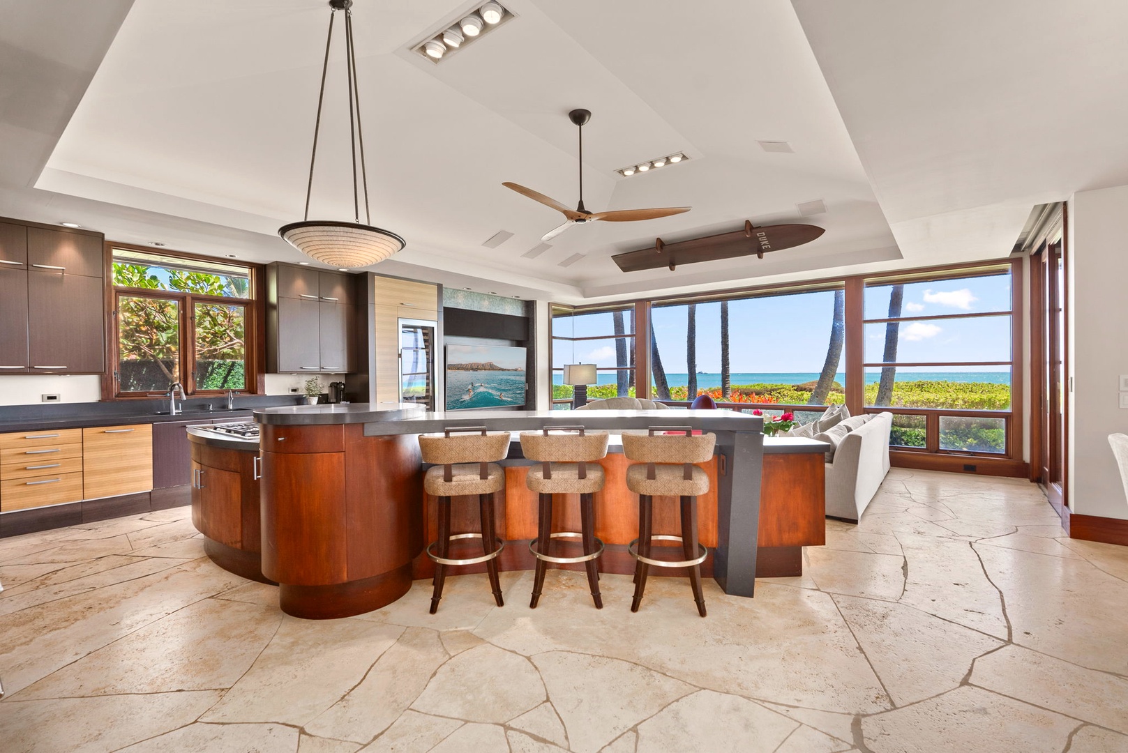Kailua Vacation Rentals, Kailua Sands - Kitchen island with seating and ocean views.