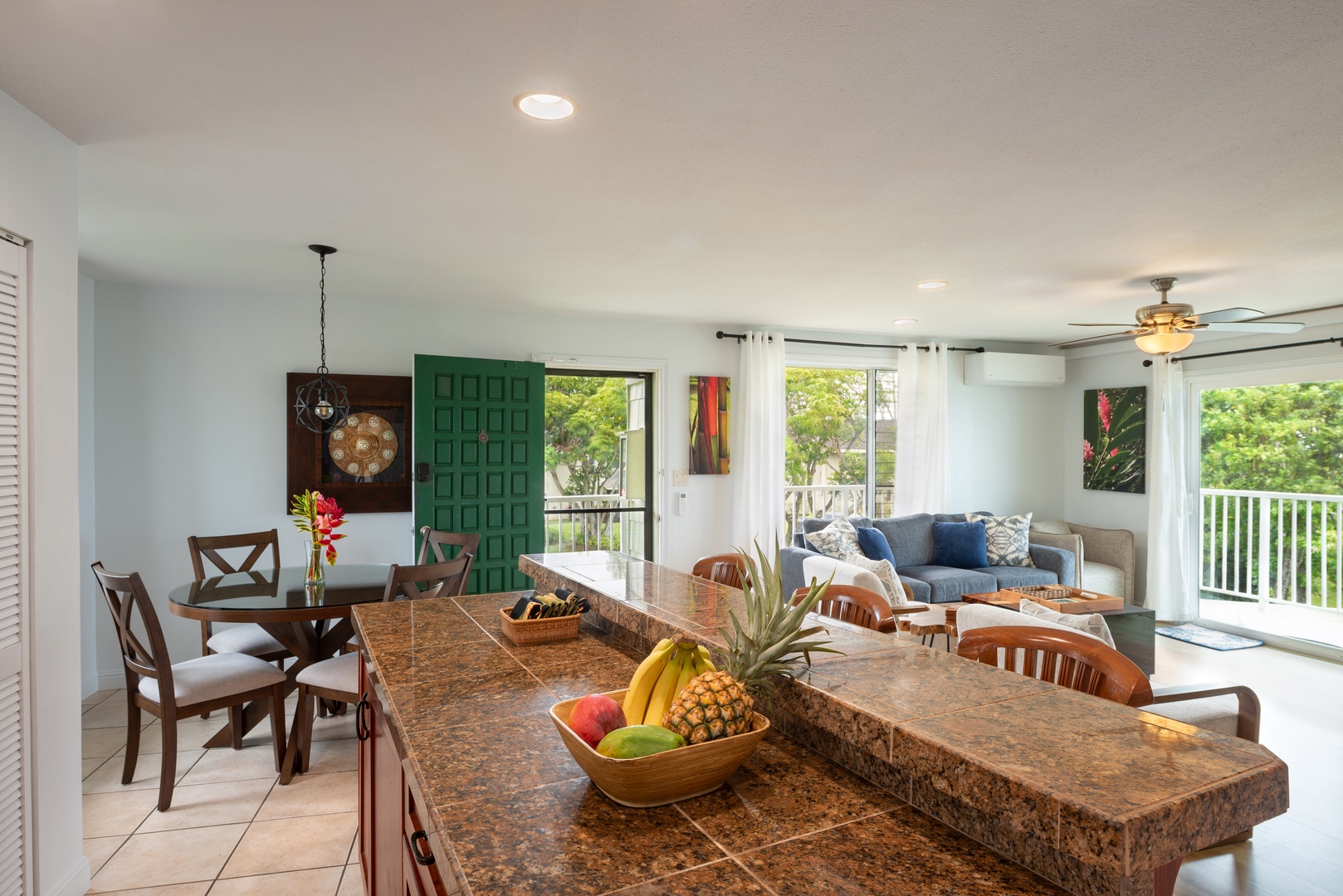 Princeville Vacation Rentals, Moana Kai - Dinner at the table, drinks drifting to the sofa, the ocean out the sliders all evening.