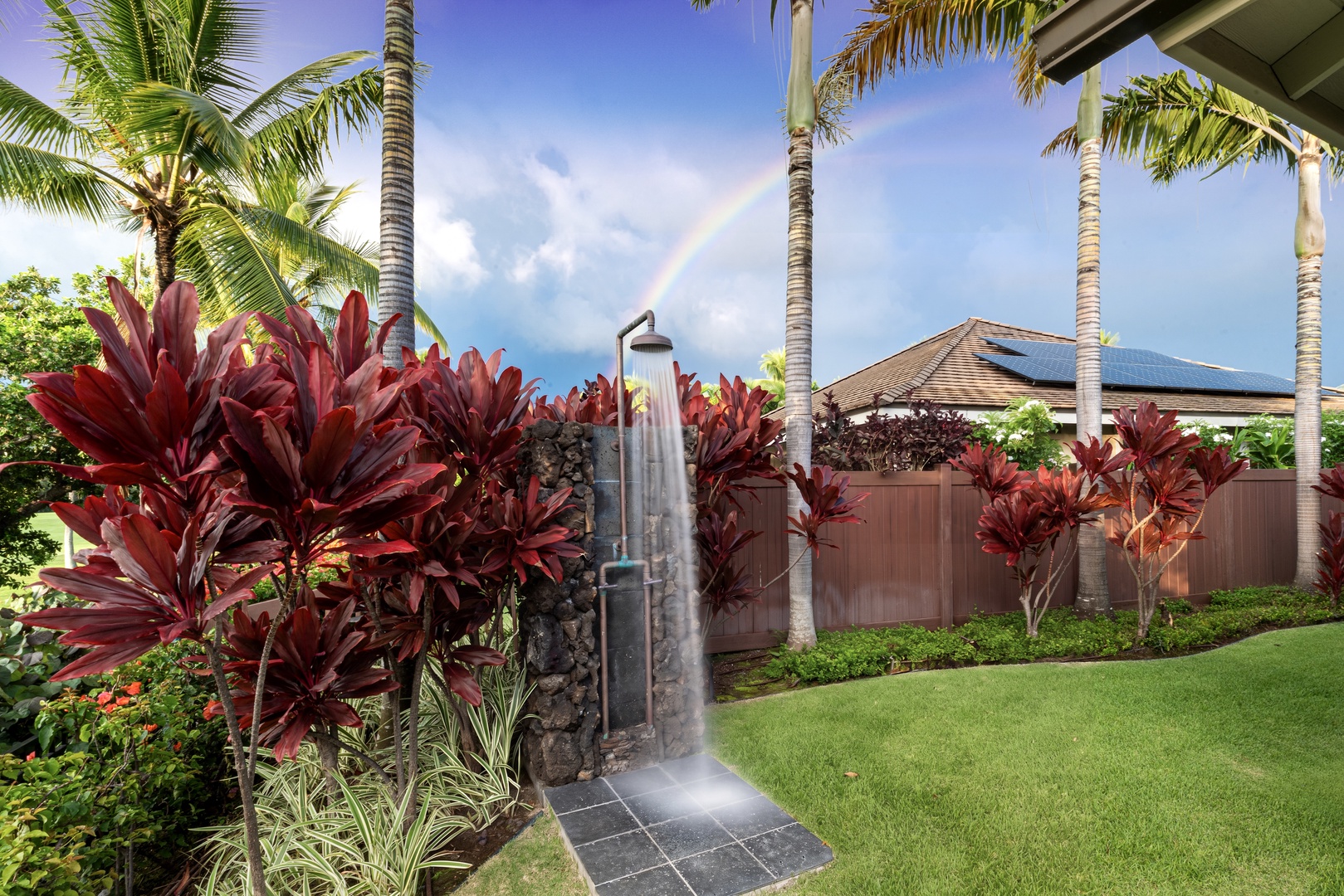 Kailua Kona Vacation Rentals, Holua Kai #27 - Hose off the salt outdoors under the palms before heading in.