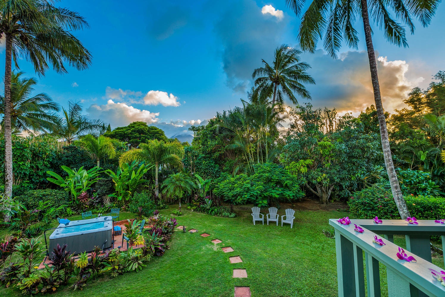 Princeville Vacation Rentals, Hale Anu Keanu - View from the back lanai... mountains and garden at sunset.