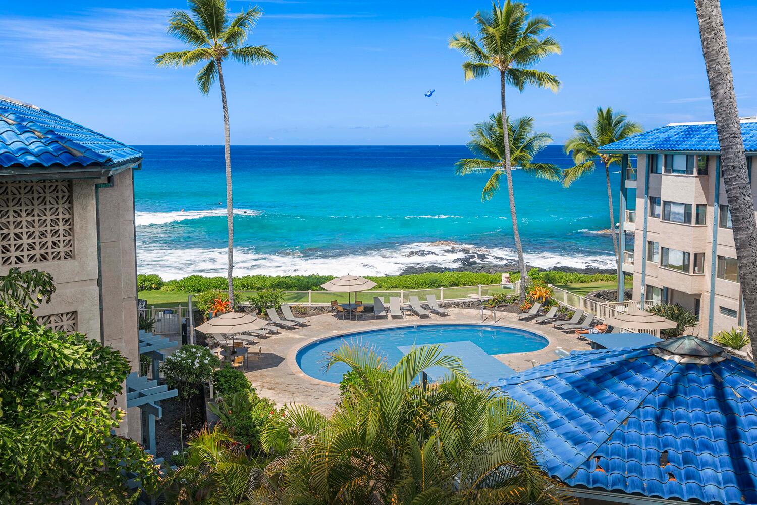 Kailua Kona Vacation Rentals, Kona Reef F11 - Actual View from Lanai of Unit F-11 over the Pool Area to the Ocean beyond.