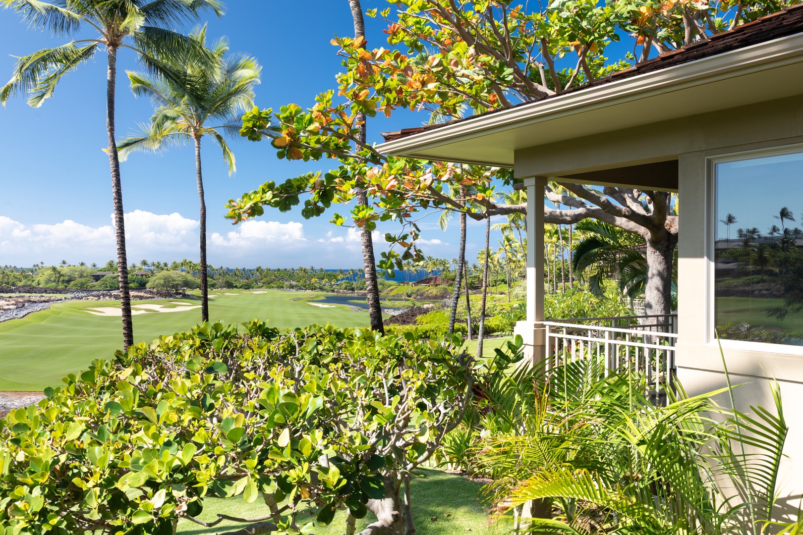 Kailua Kona Vacation Rentals, 3BD Waiulu Villa (111D) at Hualalai Resort - Serene balcony view of the championship golf course in this stunning oceanfront setting with swaying palms and lush landscaping.