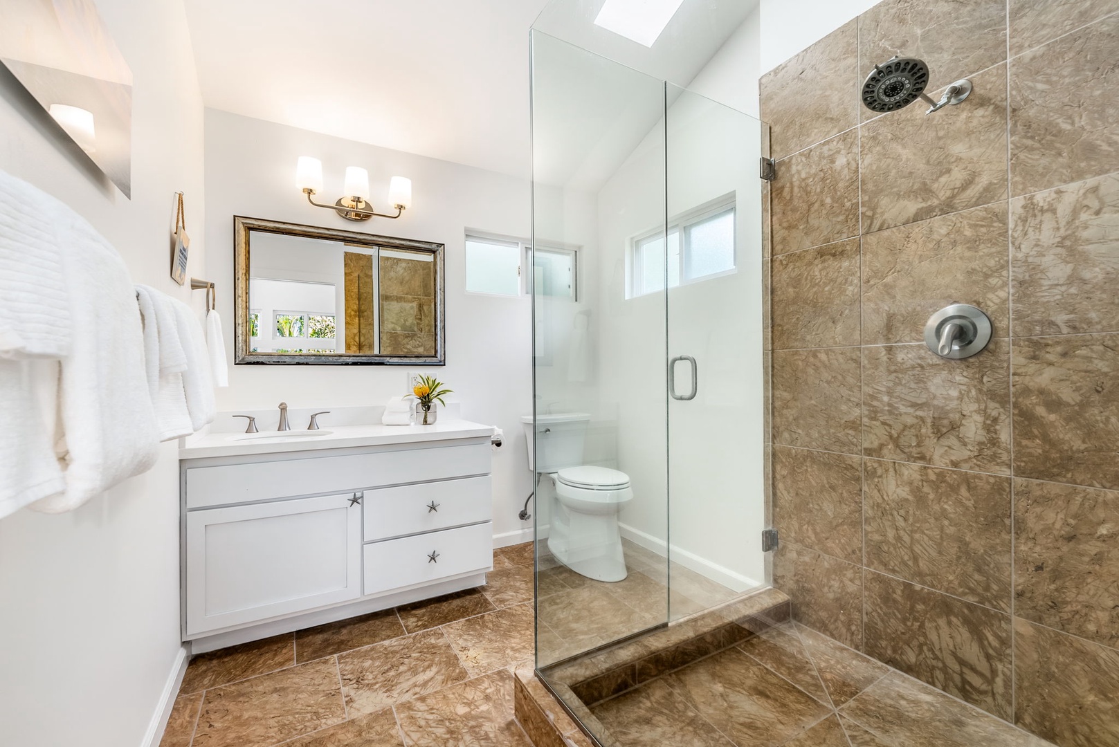 Kailua Vacation Rentals, Nohie Lanikai - A spacious walk-in shower and dual vanity offer a refreshing start to your day.