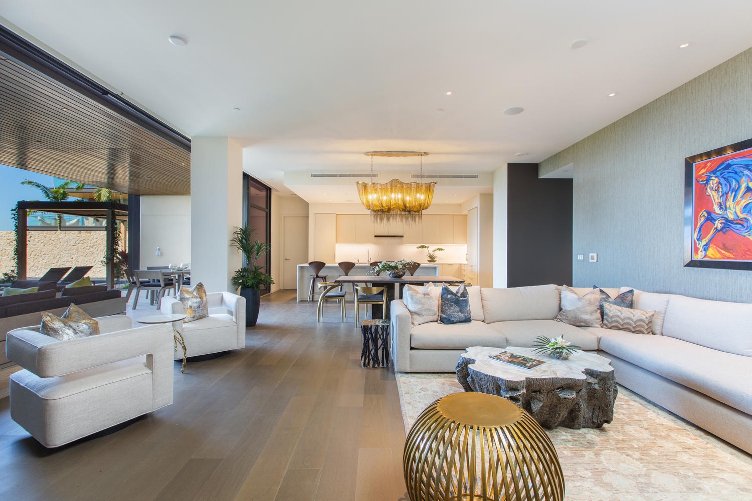 Honolulu Vacation Rentals, Park Lane Sunset Resort - Sophisticated living space, where contemporary design meets comfort beneath stunning artwork and ambient lighting.