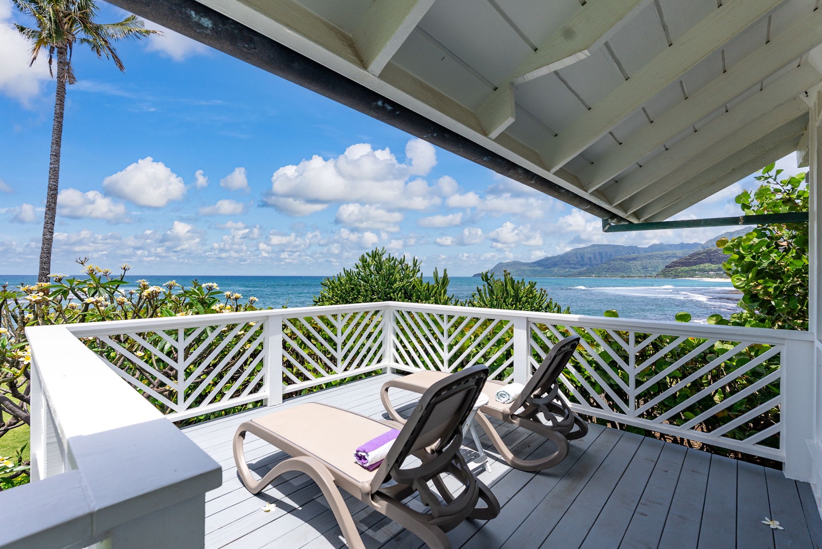 Waianae Vacation Rentals, Ma'ili Blue Estate - Your private balcony offers breathtaking ocean views where you can unwind on comfortable loungers while watching waves roll toward distant mountains.