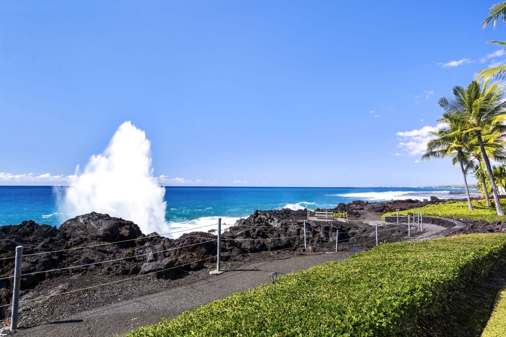 Kailua Kona Vacation Rentals, Keauhou Kona Surf & Racquet 1104 - Feel the power of the ocean with stunning views of waves crashing against nearby cliffs – perfect for nature lovers