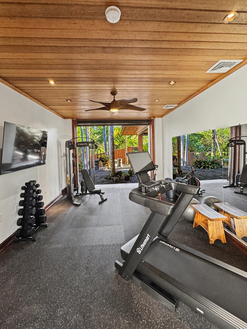 Kailua-Kona Vacation Rentals, Hahalua Bay Villa - Your private fitness retreat features professional equipment and tropical garden views to energize your workout routine.