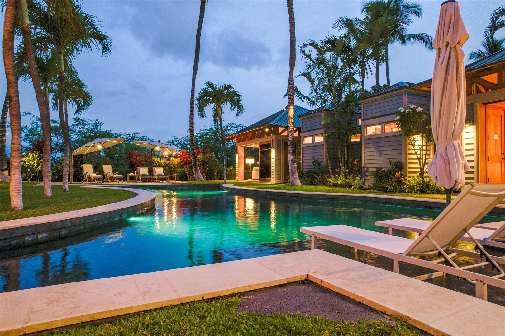 Kamuela Vacation Rentals, 3BD Na Hale 3 at Pauoa Beach Club at Mauna Lani Resort - Dusk turns the pool to glass, the loungers angled toward the fading sky.