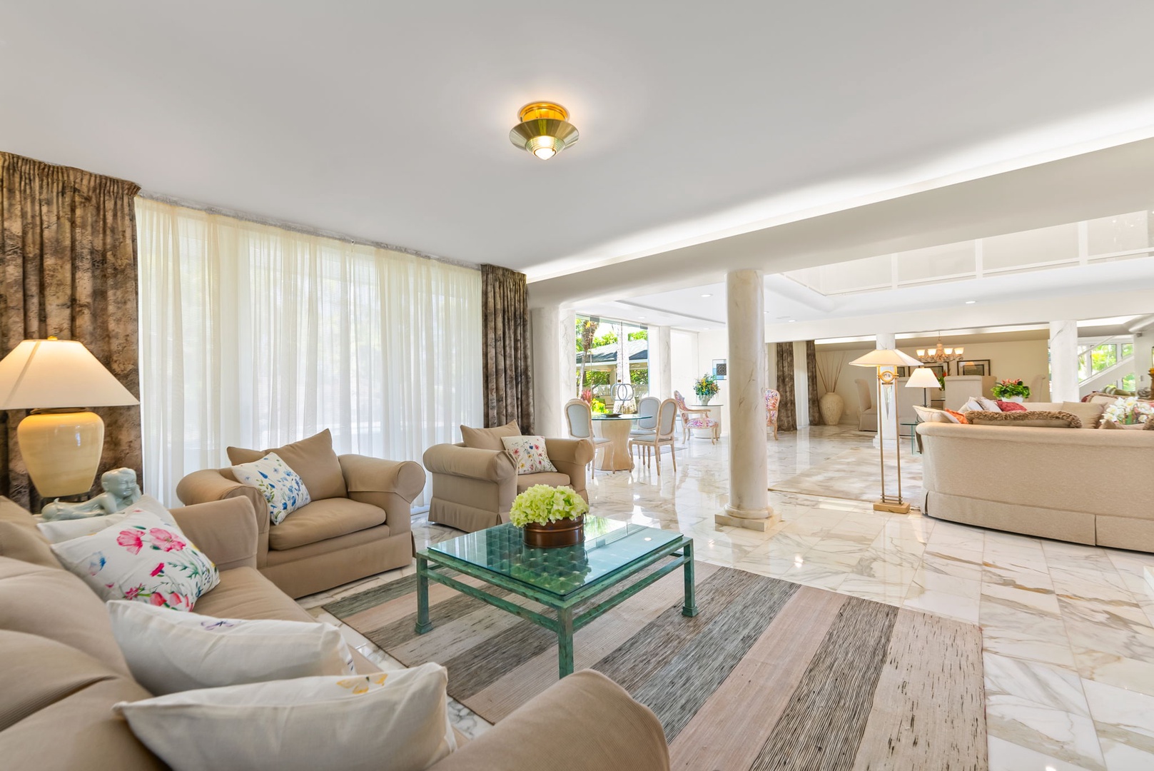 Honolulu Vacation Rentals, Kahala Oasis - Comfortable living room with an open layout and stylish decor, creating a welcoming space to relax and unwind.