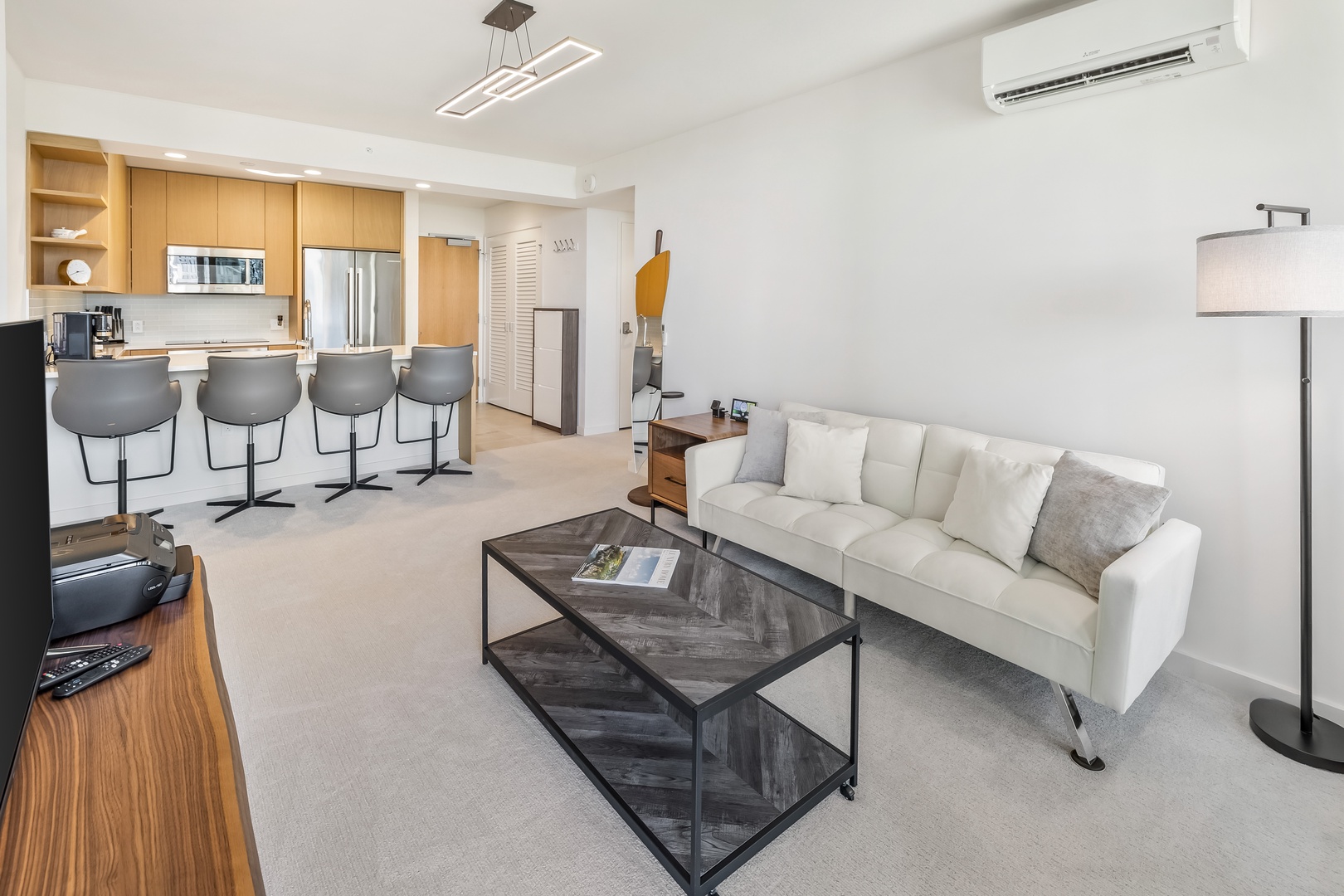 Honolulu Vacation Rentals, Sky Ala Moana #1701 - Comfortable living space with a cozy sofa, perfect for relaxing after a day of exploring.