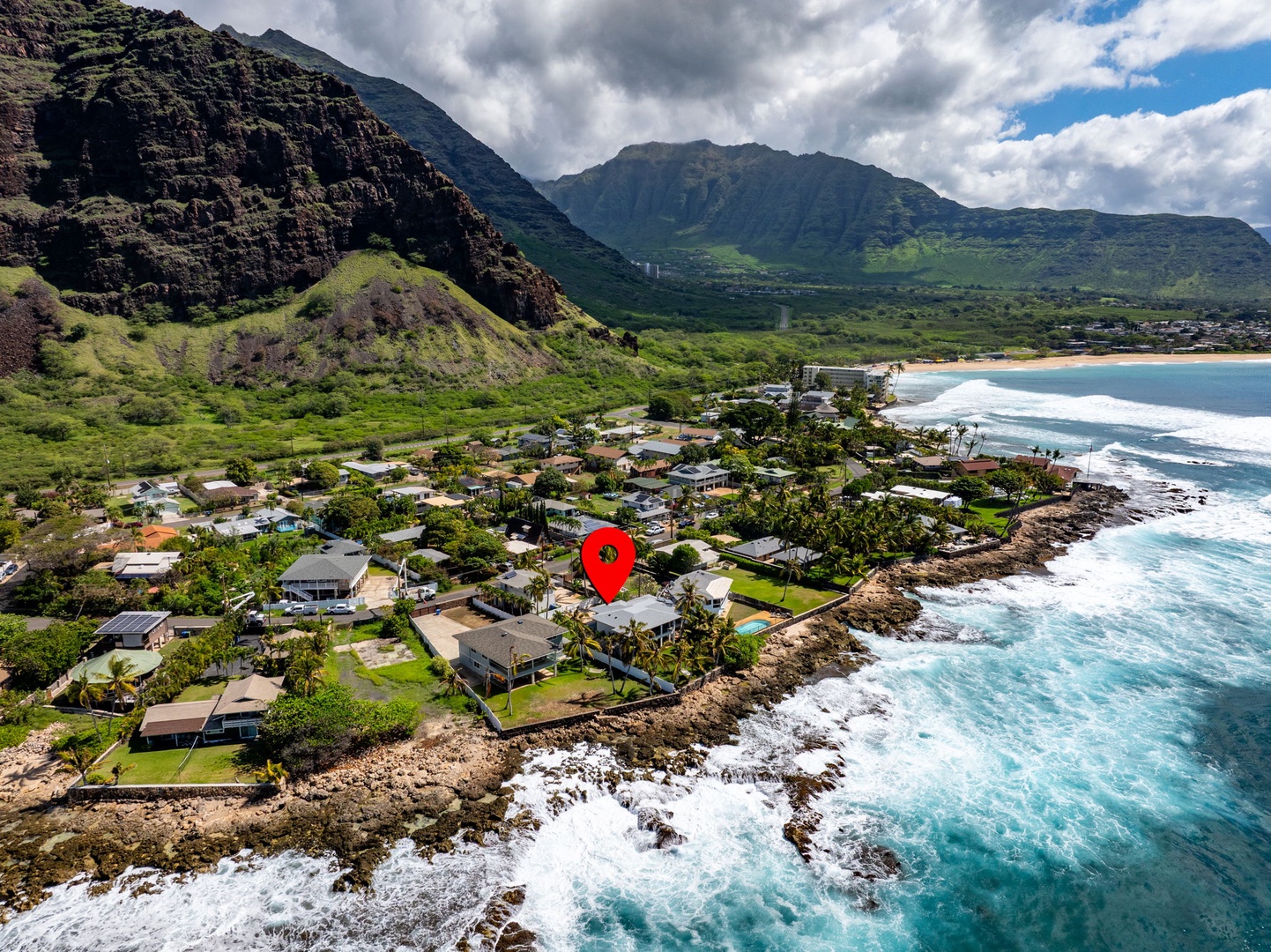 Waianae Vacation Rentals, Oceanfront Luxury Dream Estate - This drone shot captures the estate’s front and rear grounds, with stunning Pacific and mountain views.