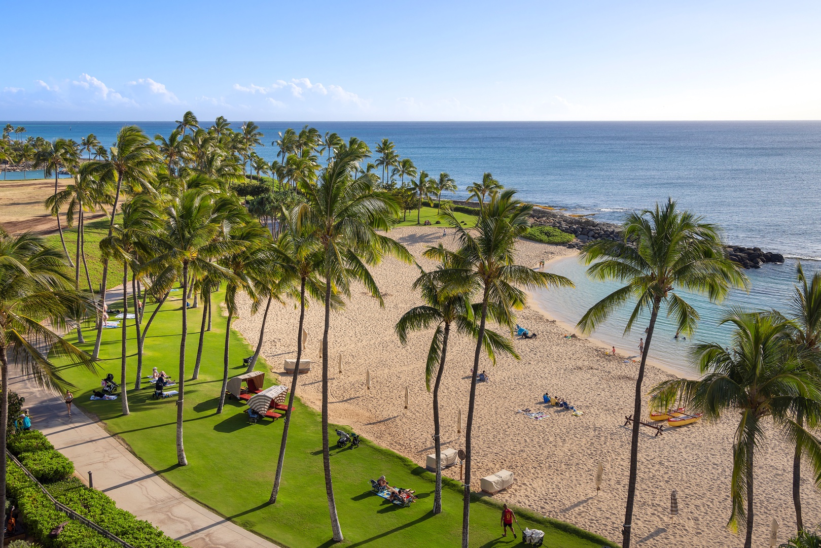 Kapolei Vacation Rentals, Ko Olina Beach Villas B610 - The lagoon is the perfect spot to relax under the trees and enjoy the beach.