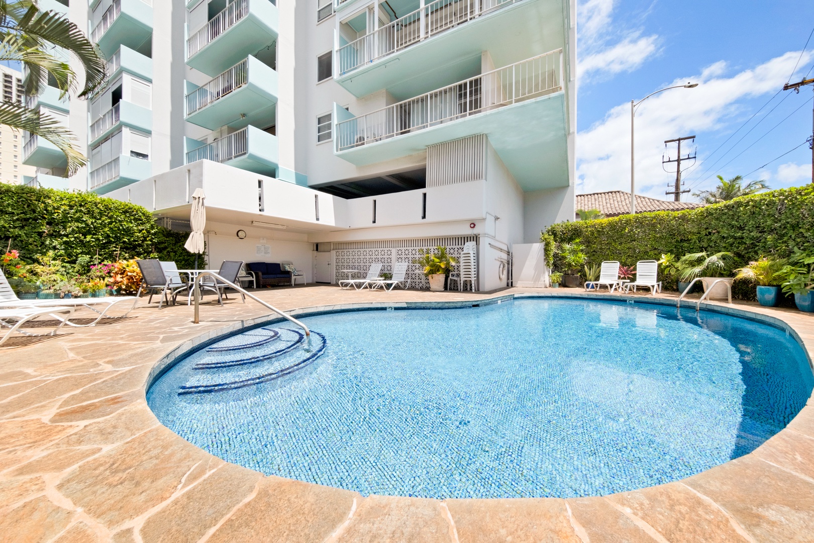 Honolulu Vacation Rentals, Hale Pono Waikiki - Enjoy a refreshing swim in this inviting pool, surrounded by the comfort and convenience of your vacation home.