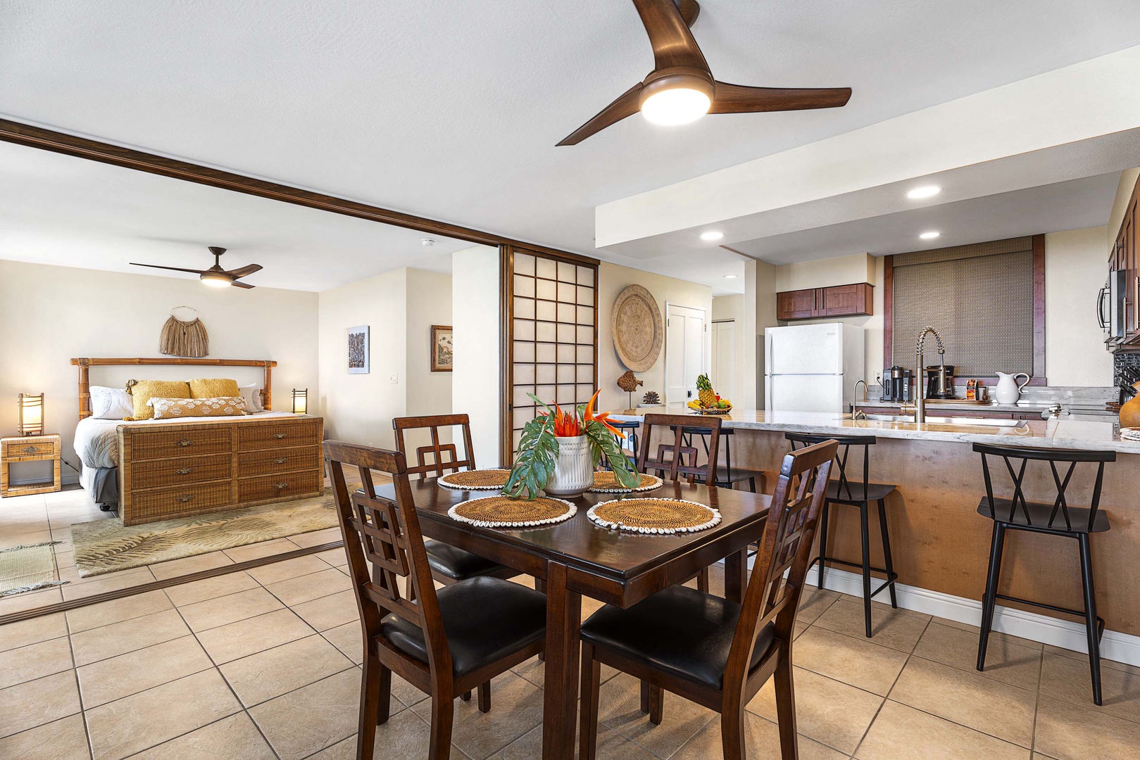 Kailua Kona Vacation Rentals, Keauhou Kona Surf & Racquet 2101 - The kitchen area is right beside the dining, a seamless blend of spaces designed for flow and communal living.