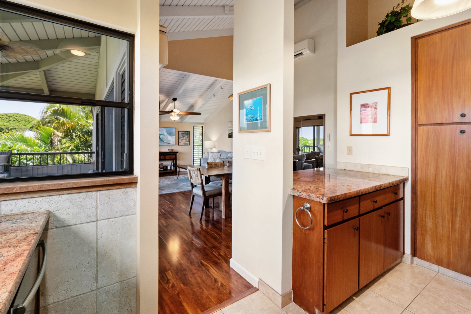 Kihei Vacation Rentals, Wailea Ekolu 204 - Hand a drink through the pass-through window and it lands straight on the lanai, no detour required.