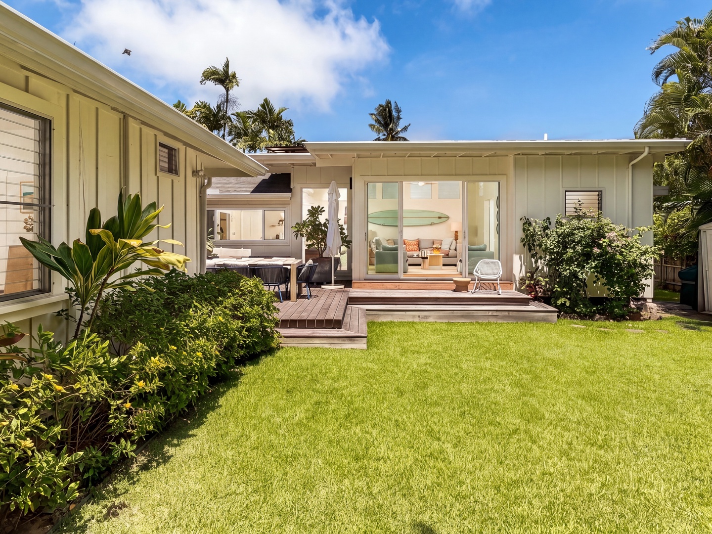 Kailua Vacation Rentals, Lanikai Ola Nani - A sunlit lawn, a lanai for dining, and the living spaces open to it all: the backyard is where the house comes together.
