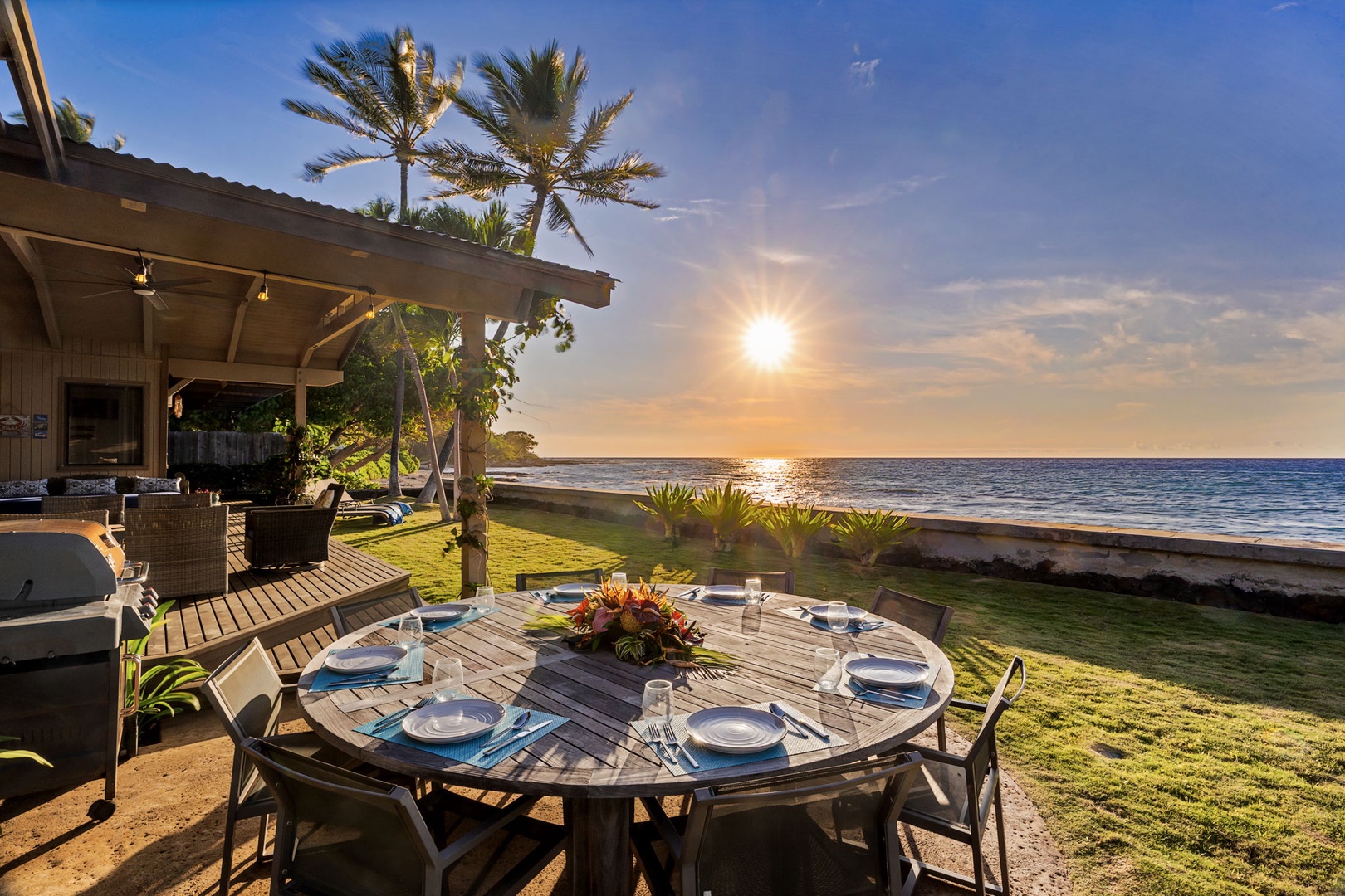 Kamuela Vacation Rentals, Island Time Retreat - Fresh flowers on the table, the sun sinking into the sea just beyond.