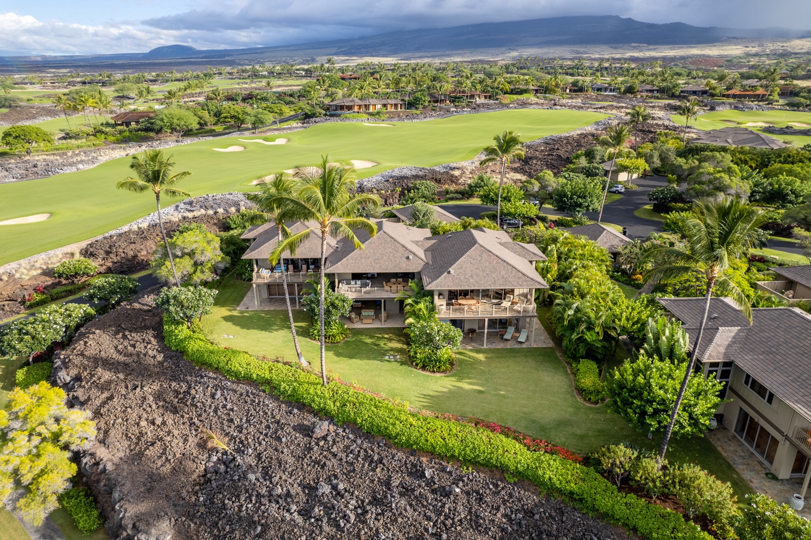 Kailua Kona Vacation Rentals, 3BD Ke Alaula Villa (210B) at Four Seasons Resort at Hualalai - Wide shot of back of property showcasing Mt. Hualalai beyond