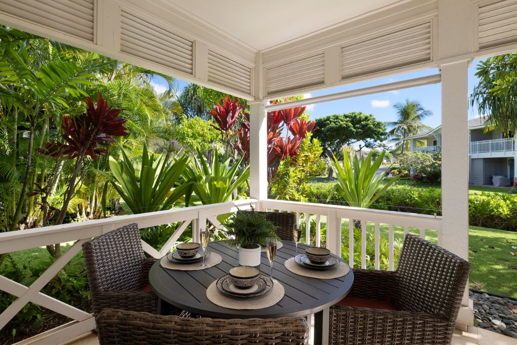 Kapolei Vacation Rentals, Coconut Plantation 1190-1 - The bedroom lanai with seating for four.