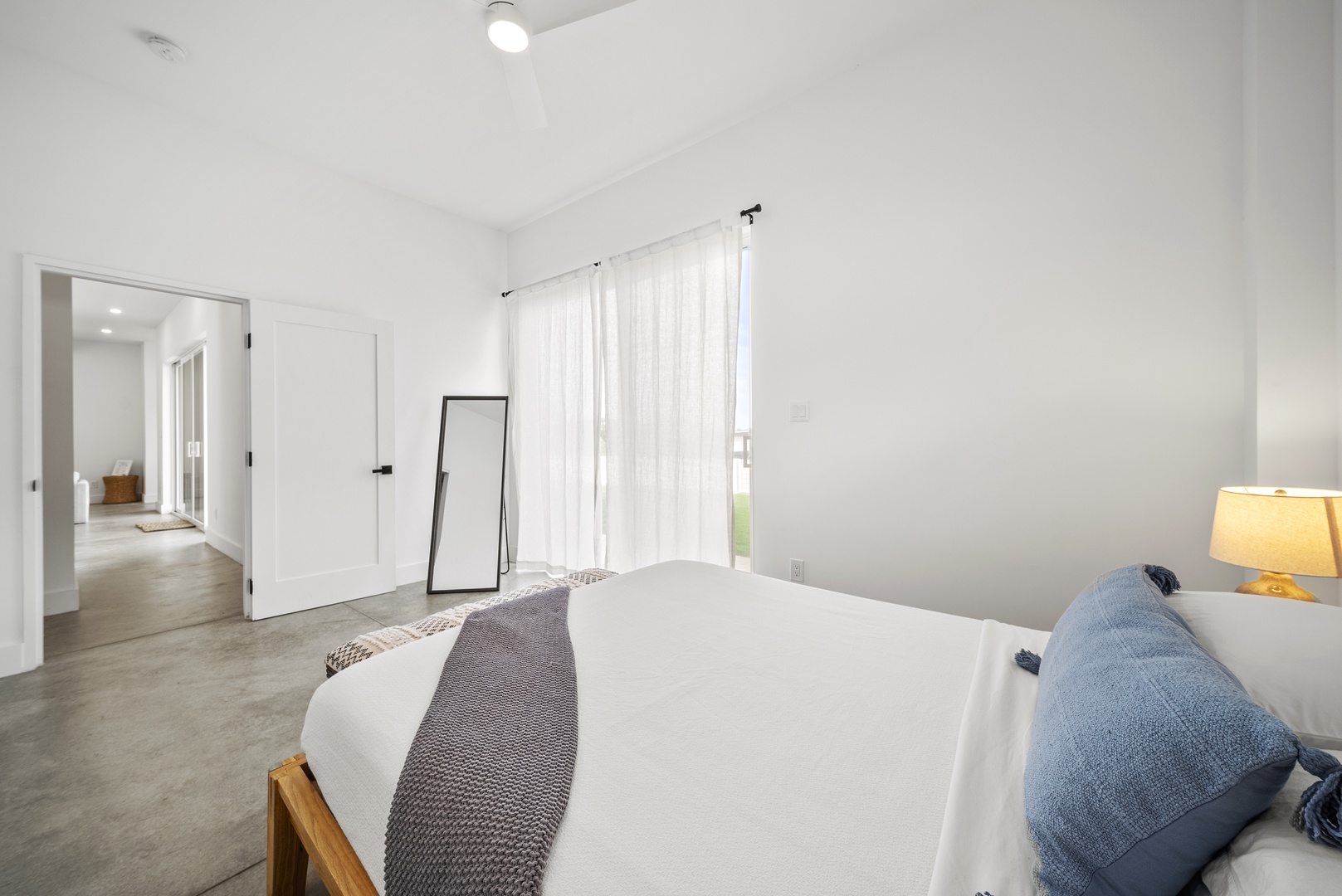 Haleiwa Vacation Rentals, Villa Bianca - Minimalist suite with a dresser to keep your essentials organized during your stay.