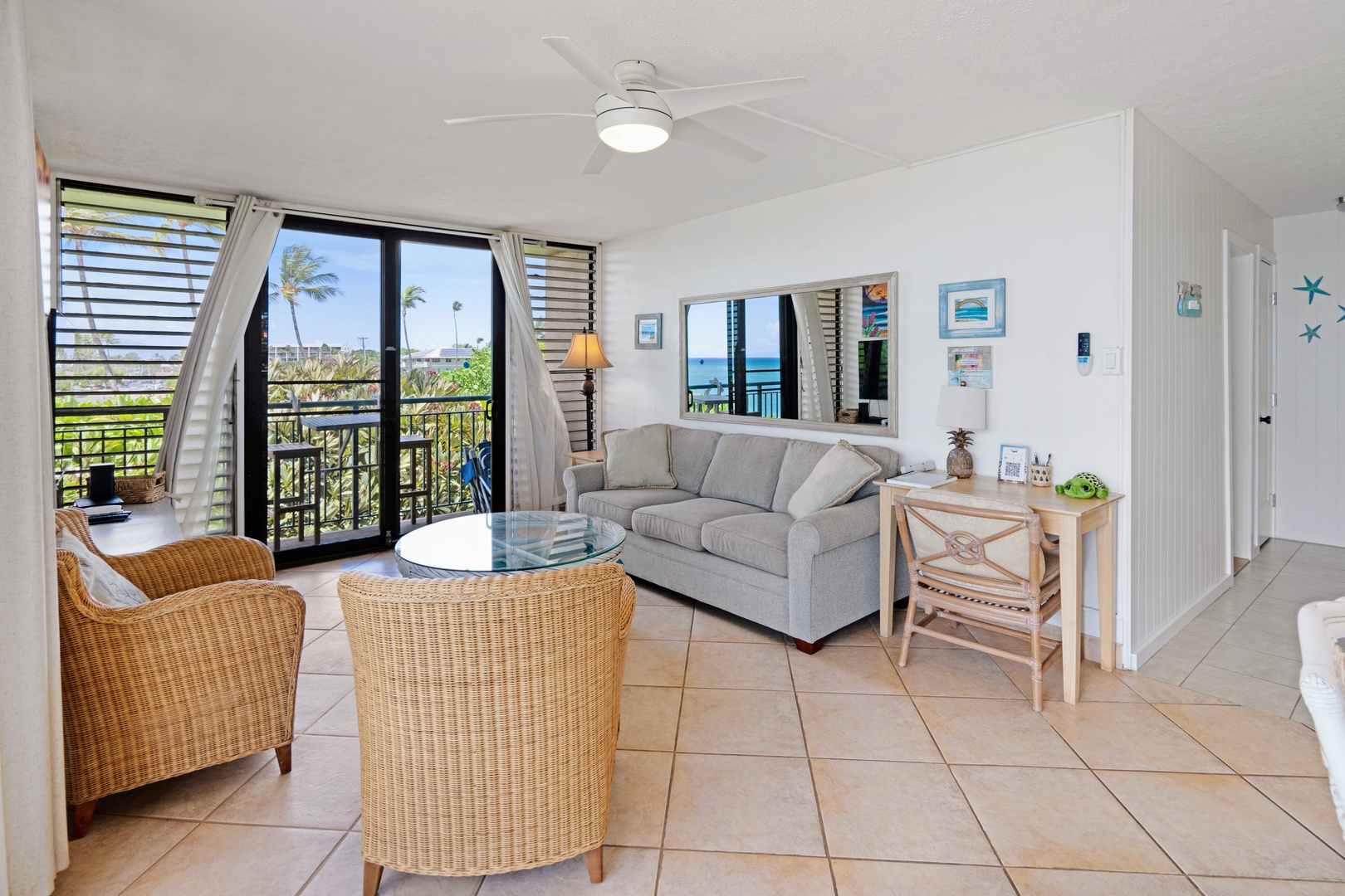 Kihei Vacation Rentals, Punahoa Beach 205 - The mirror catches the same ocean view sitting just outside, doubling the light in the room.