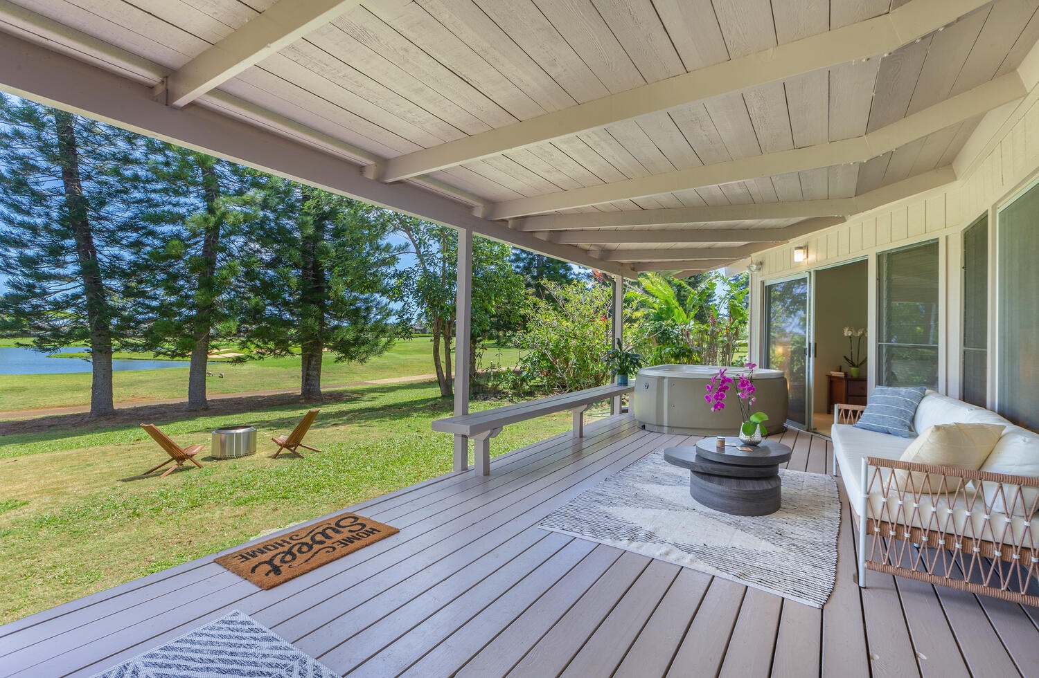 Princeville Vacation Rentals, Wai Puna - This covered deck offers the perfect space to cool down and enjoy the outdoors