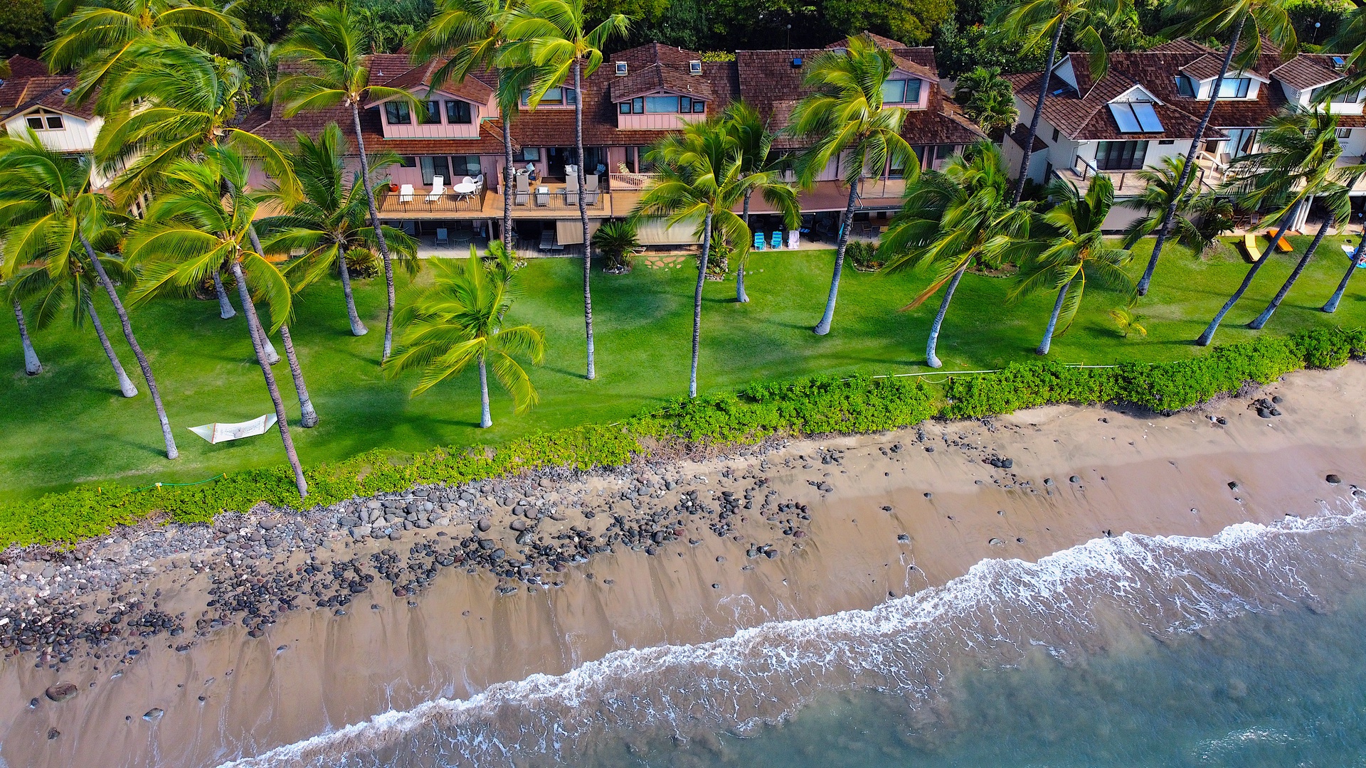 Lahaina Vacation Rentals, Puamana 240-3 - Relax at the edge of the beach, where tropical gardens meet the gentle shoreline.