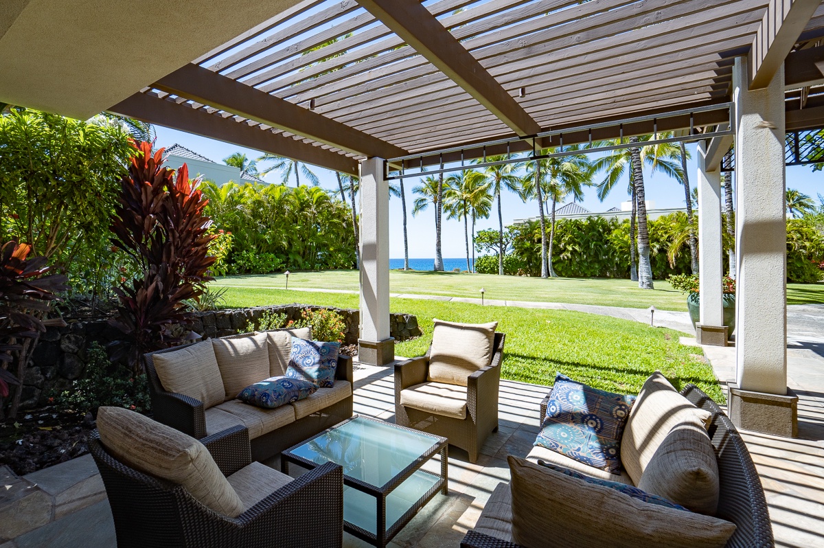 Kamuela Vacation Rentals, Mauna Lani Point B105 - Outside furniture in the communal area