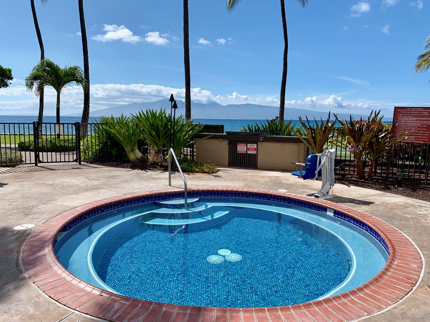 Lahaina Vacation Rentals, Papakea L-106 - Relax and unwind in the hot tub with stunning ocean views as the perfect backdrop for a serene getaway experience.