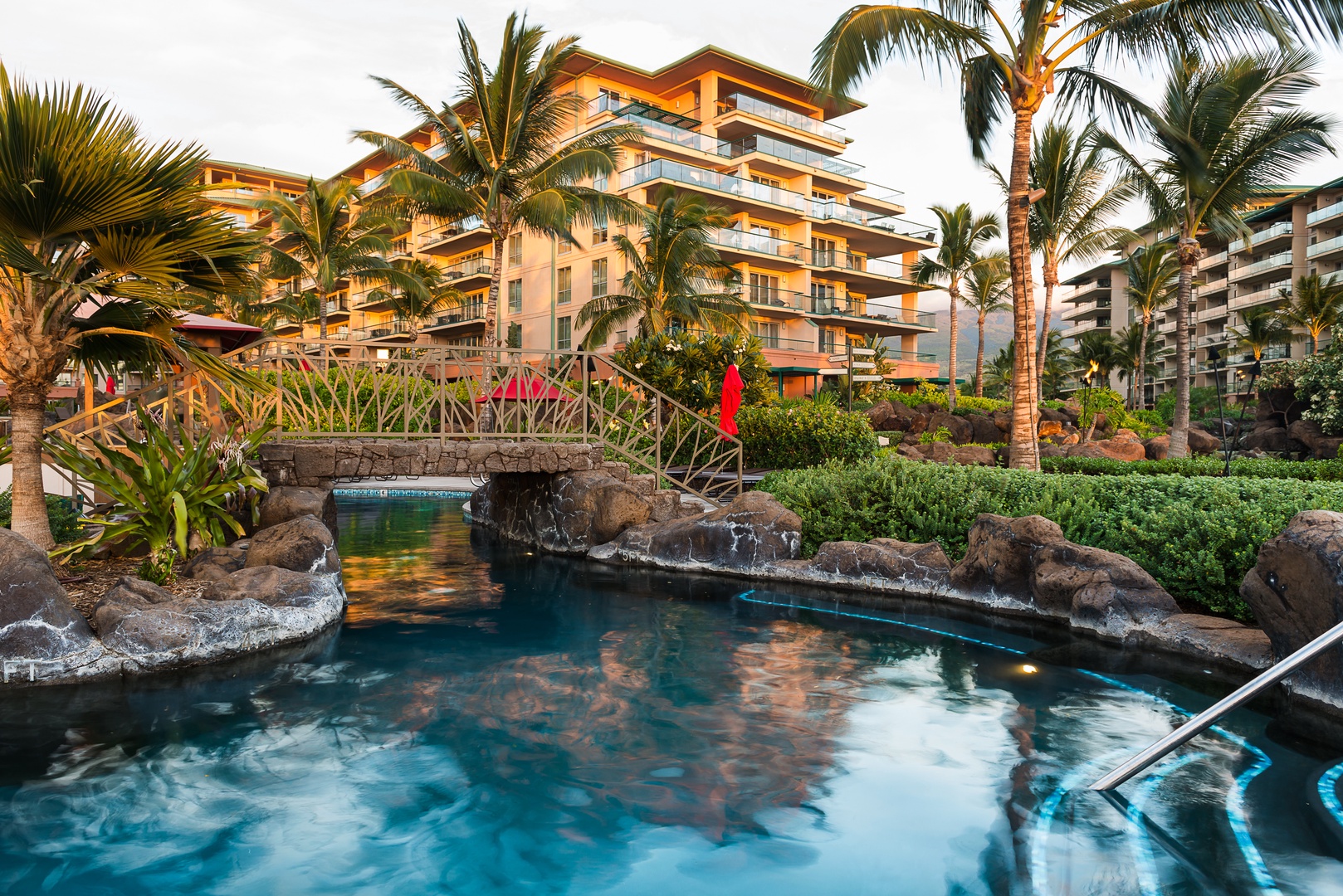 Lahaina Vacation Rentals, Honua Kai Hokulani 214 - Sunset reflections over the pool at Hokulani 214 'Kamalu'—the perfect end to a Maui day.