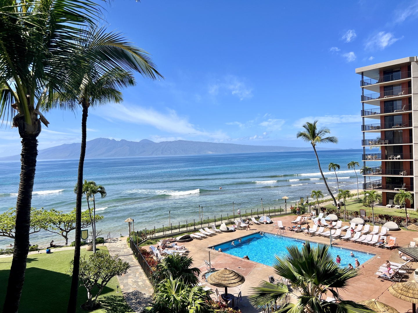 Lahaina Vacation Rentals, Kaanapali Shores 702 - Enjoy a relaxing day by the pool with breathtaking ocean views just steps away.