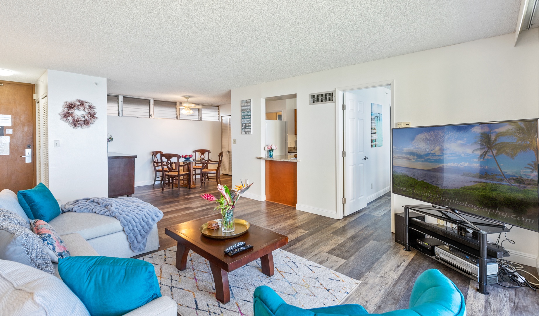 Lahaina Vacation Rentals, Royal Kahana 308 - The open layout seamlessly connects the living room and dining area, creating a welcoming space for gathering and entertainment.