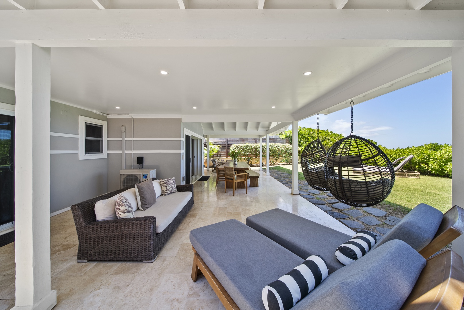 Haleiwa Vacation Rentals, Hale Nalu (Lower Level) - Lounge in comfort on the shaded lanai, just steps from the sand and perfect for afternoon naps.