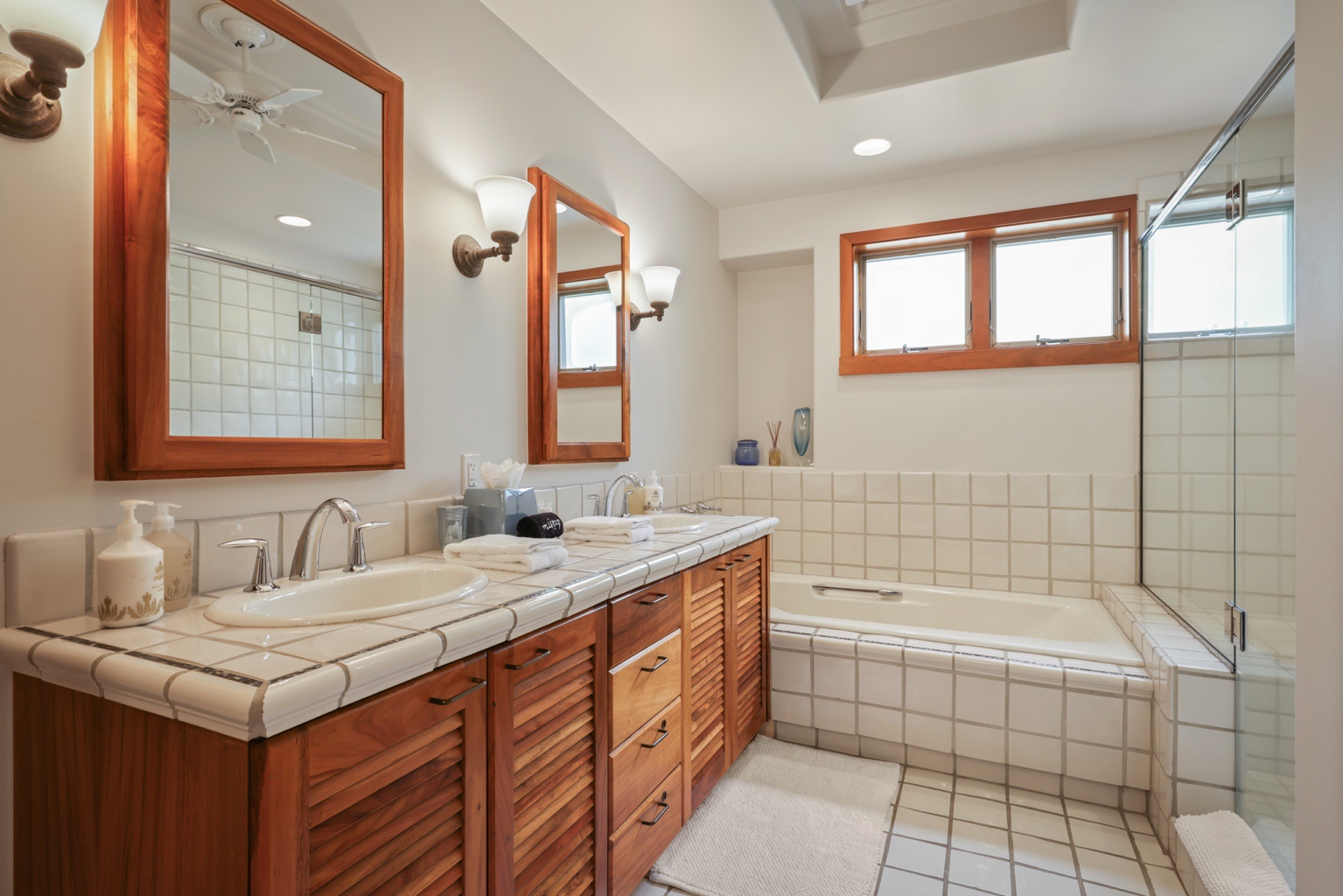 Kailua Kona Vacation Rentals, 3BD Golf Villa (3101) at Hualalai Resort - Second bathroom w/dual vanity, soaking tub & walk-in shower.