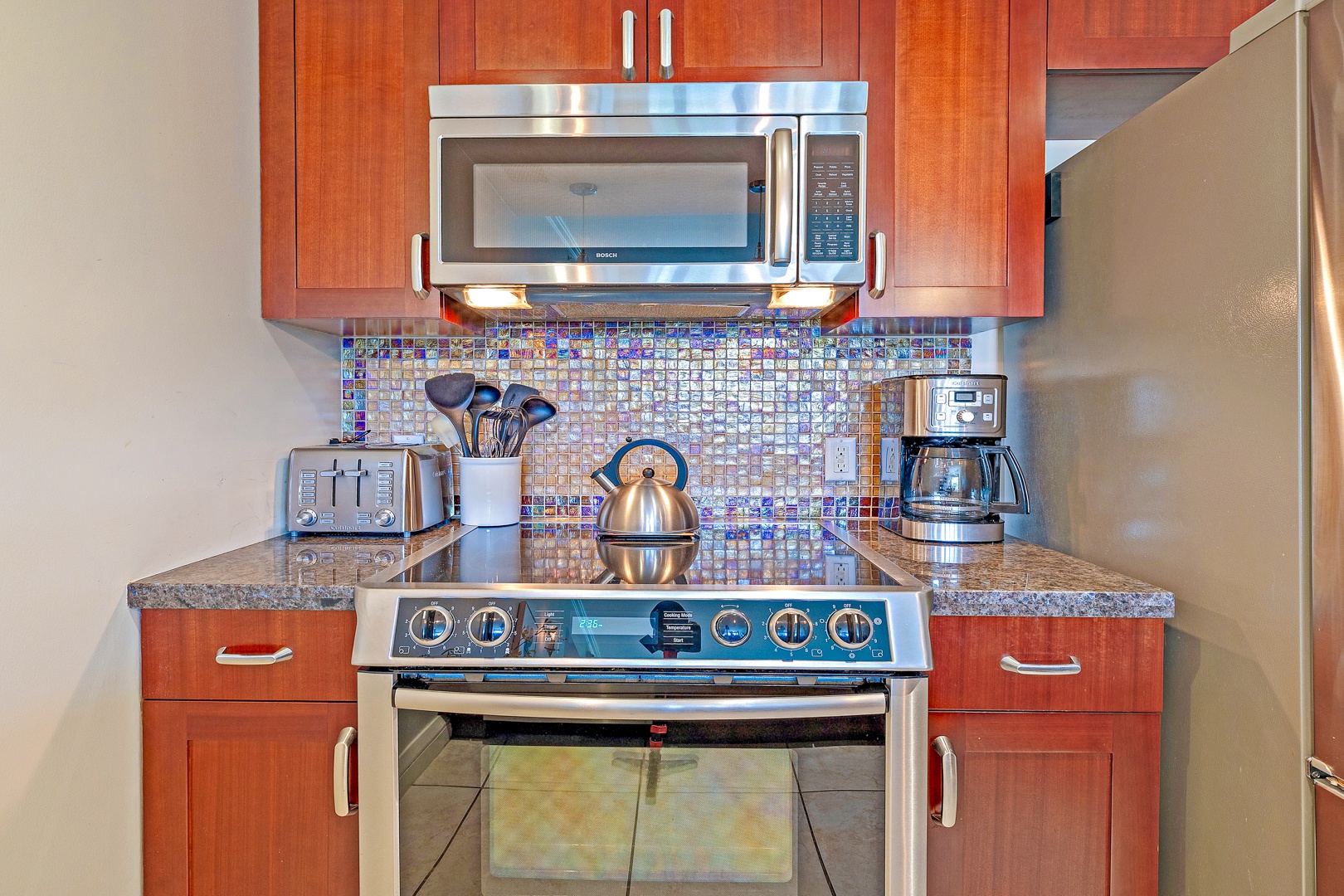 Lahaina Vacation Rentals, Honua Kai Konea 206 - The kitchen features stainless steel appliances.